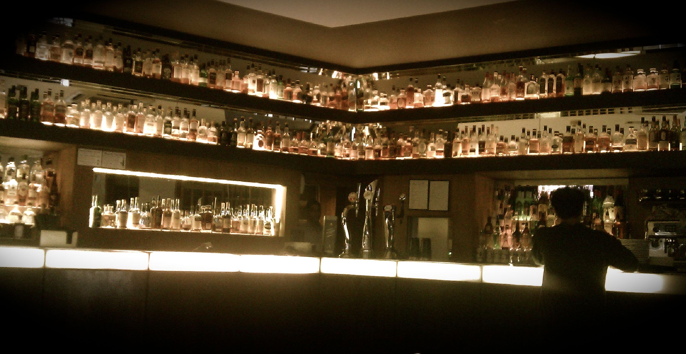Shelves of whisky bottles at Salt Bar in London